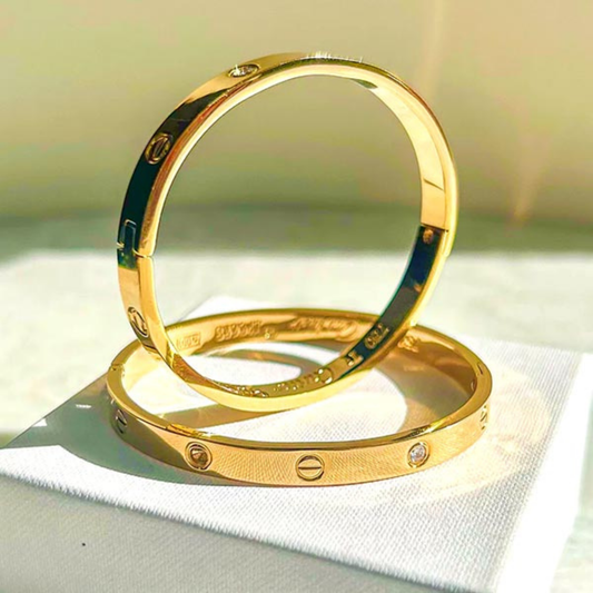 Gold Tone Screw Motif Cuff Bracelet with CZ Stones