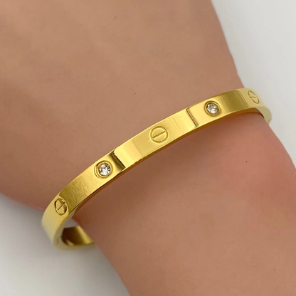 Gold Tone Screw Motif Cuff Bracelet with CZ Stones