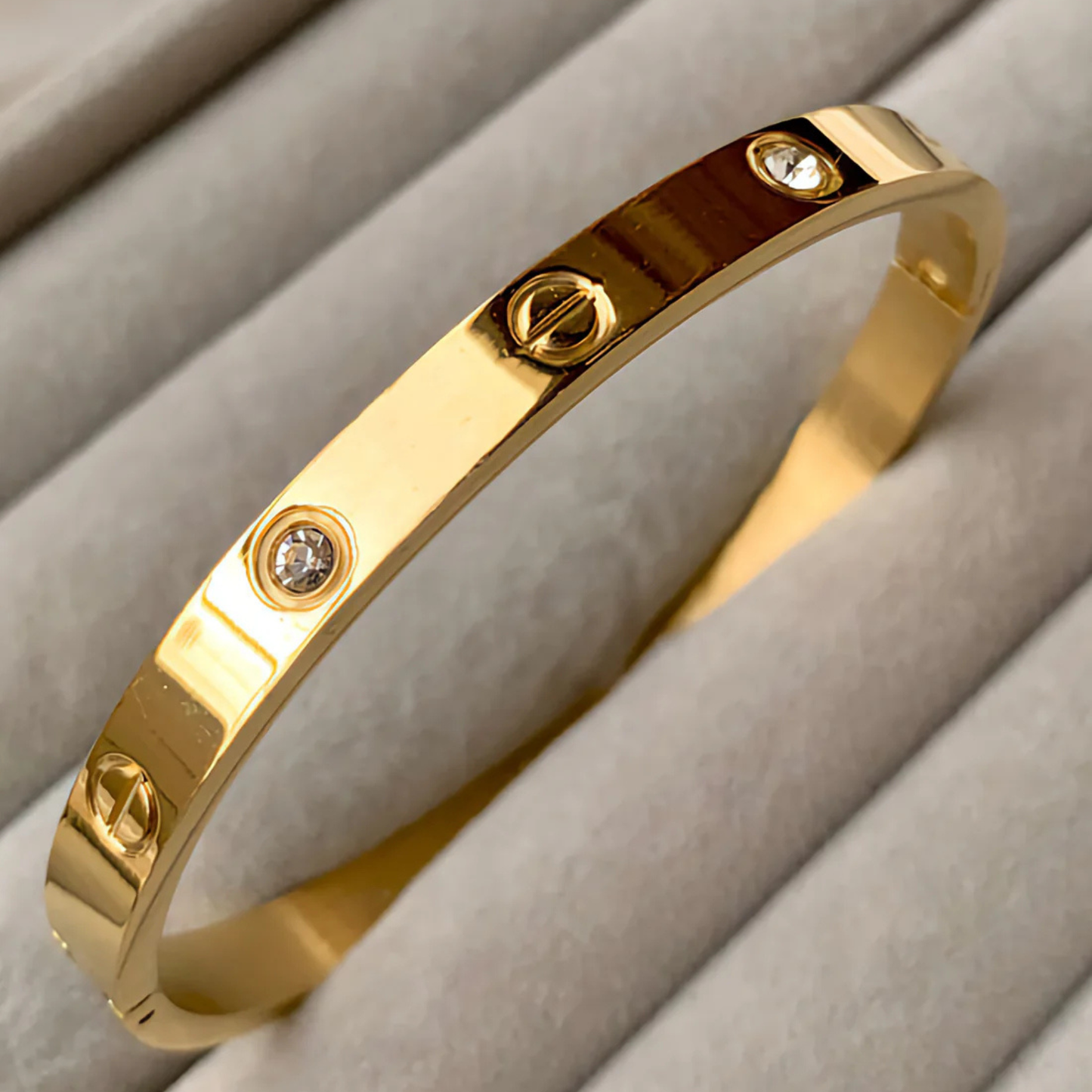 Gold Tone Screw Motif Cuff Bracelet with CZ Stones