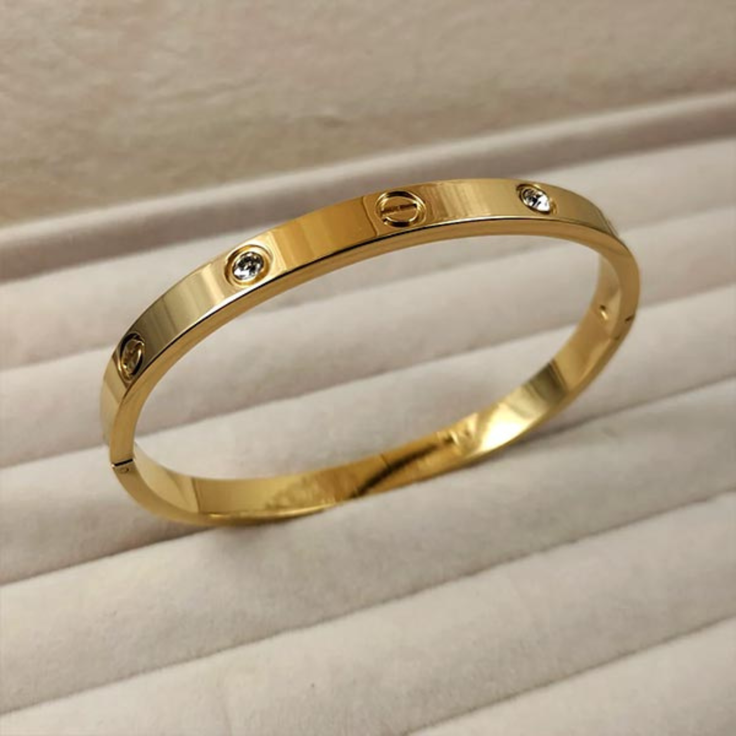 Gold Tone Screw Motif Cuff Bracelet with CZ Stones