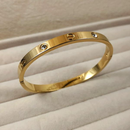 Gold Tone Screw Motif Cuff Bracelet with CZ Stones