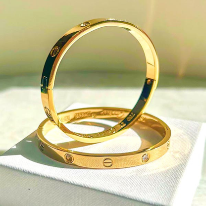 Gold Tone Screw Motif Cuff Bracelet with CZ Stones